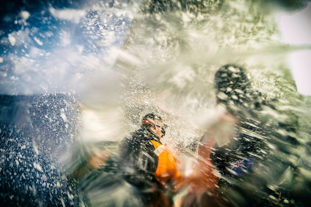 February 15, 2015. Leg 4 to Auckland onboard Team Alvimedica. Day 7. Choppy and rough trade-wind sailing in the Philippine Sea for Ryan Houston (R, at helm) and Nick Dana (L, trimming the main). (Photo ©Amory Ross / Team Alvimedica / Volvo Ocean Race)