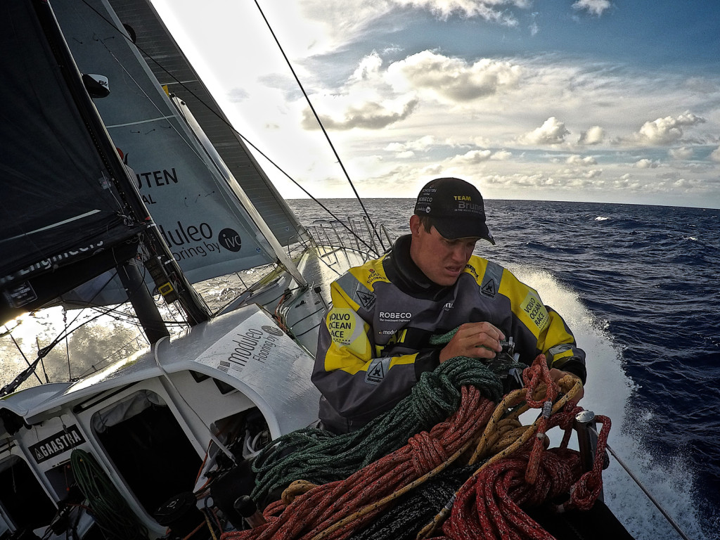  Leg 6 to Newport onboard Team Brunel. Day 15. Rokas Milevicius stacks the sheets to the high side of the boat when the wind suddenly picks up. (Photo by Stefan Coppers / Team Brunel / Volvo Ocean Race )
