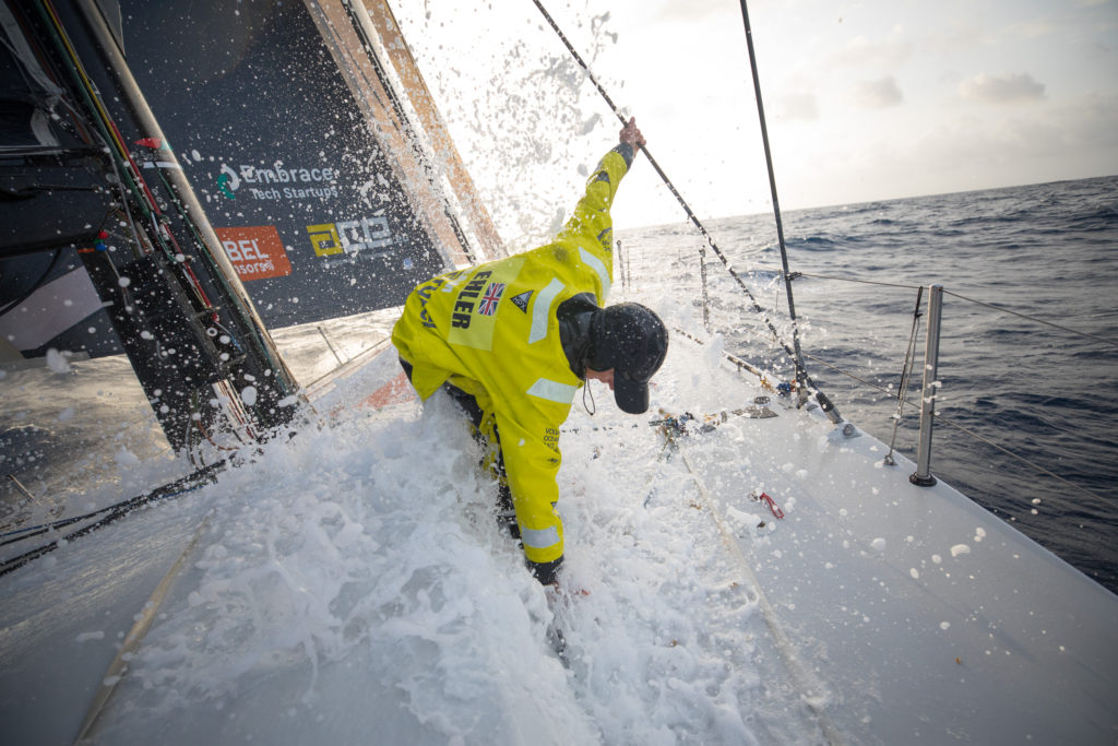 Leg 8 from Itajai to Newport, day 11 on board Brunel. Abby Ehler on the bow cleaning Sargassum weeds. 02 May, 2018.3 Sam Greenfield/Volvo Ocean Race