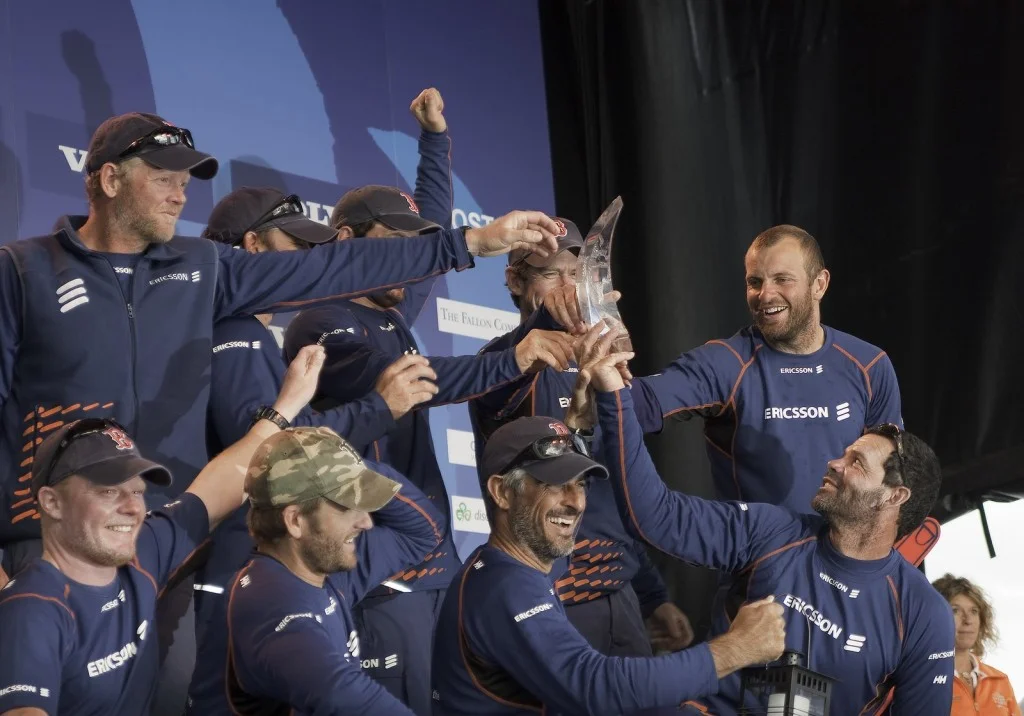 The Crew of Ericsson 4 Accepting The Trophy For Leg 6 (Photo By George Bekris)