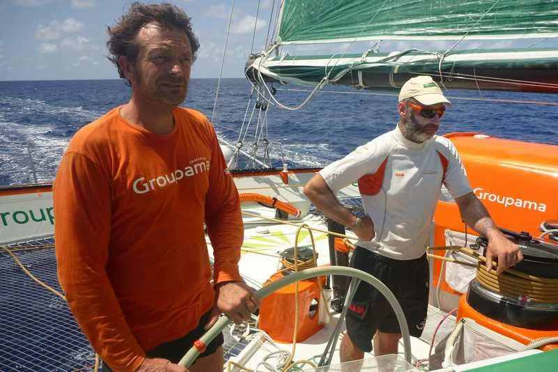 Fred Le Peutrec At The Helm Of Groupama 3 and Loic Le Mignon At His Side (Photo Courtesy of Team Groupama)