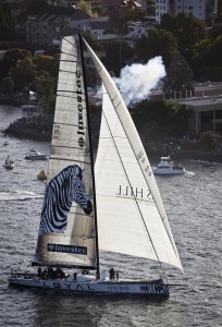 Investec Loyal crossing the finish line for Line Honours (Photo by Rolex / Daniel Forster)