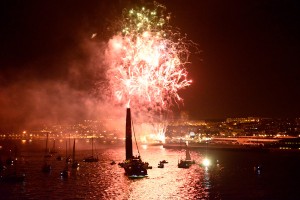 Fireworks go off in the city of Lisbon, as Abu Dhabi Ocean Racing, skippered by Ian Walker from the UK, finish first on leg 7, from Miami, USA to Lisbon, Portugal, during the Volvo Ocean Race 2011-12. (Photo by Paul Todd/ Volvo Ocean Race)