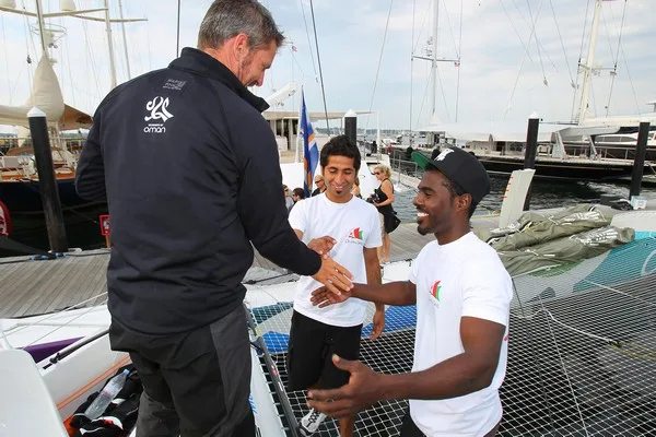 Oman Sail MOD70 crew celebrate Musandam's arrival at Newport Shipyard by Richard Langdon Ocean Images Oman Sail MOD70 crew celebrate Musandam's arrival at Newport Shipyard (Photo © Richard Langdon/Ocean Images)