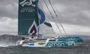 The Sultanate of Oman’s MOD70 Musandam -Oman Sail trimaran skippered by Sidney Gavignet (FRA). Shown here as the team cross the line and set a new world record for sailing round Ireland in 40h51m57s (unofficial - official to follow) Credit - Lloyd Images