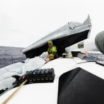 James Burwick on deck inspecting damage to Anasazi's Girl after the dismasting (Photo by Somira Sao)