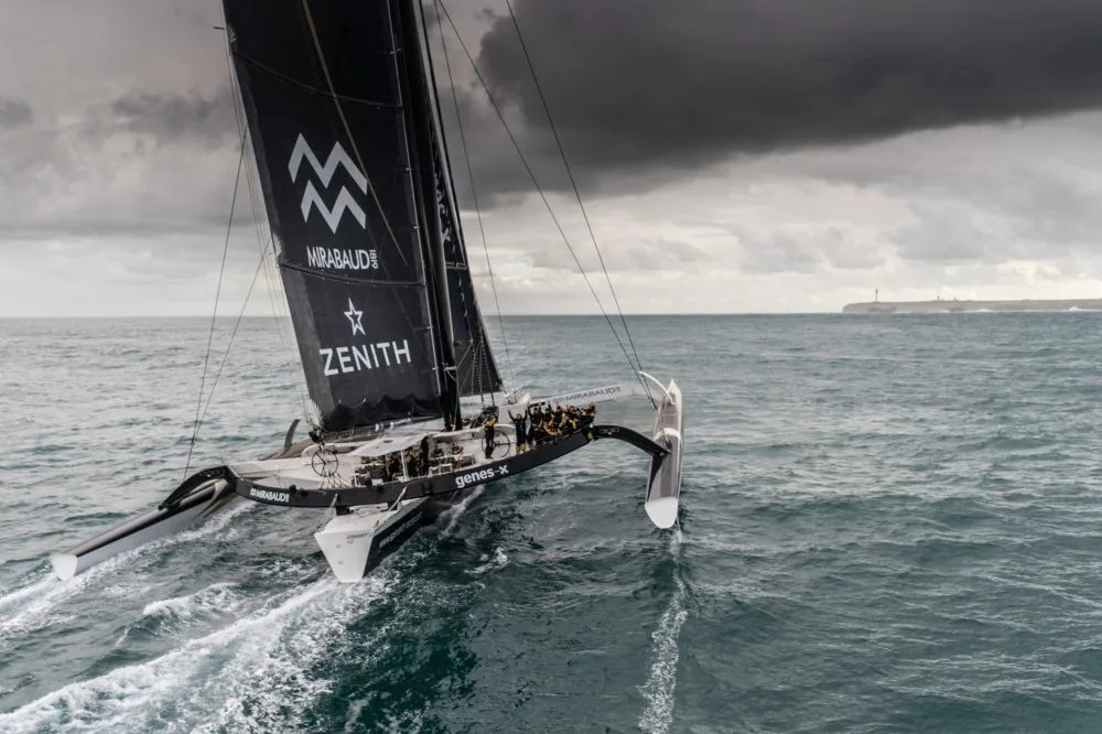 © Eloi Stichelbaut I Spindrift racing Helicopter image of Spindrift 2 crossing the finish line at Ushant.